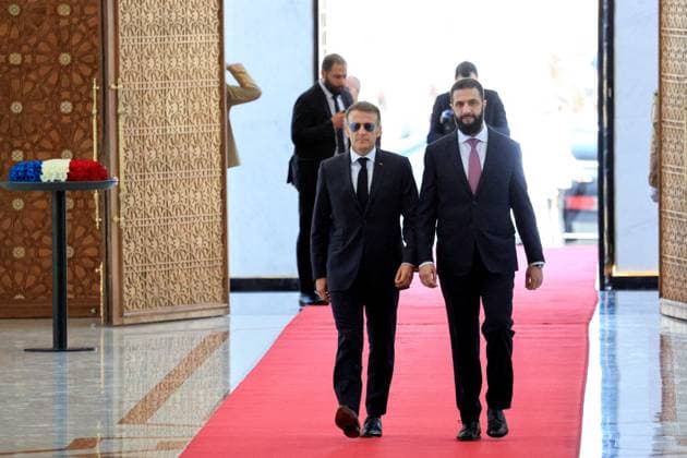 President Macron with President al-Sharaa Meeting - Damascus France s President Emmanuel Macron (L) and Syria s President Ahmed al-Sharaa arrive ahead of their meeting at the People s Palace in Damascus on July 7, 2026. Syria s President Ahmed al-Sharaa hailed France s constructive role in the transition since the toppling of longtime ruler Bashar al-Assad, as French leader Emmanuel Macron made the first post-conflict visit to Damascus by a Western European leader. Photo by Ludovic Marin Pool ABACAPRESS.COM Damascus Syria  Copyright: xMarinxLudovic Pool ABACAx