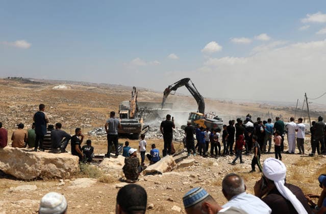 Israeli forces demolish two Palestinian homes in West Bank HEBRON, WEST BANK, PALESTINE - JULY 07: Israeli forces stand by in the area as the Israeli military demolish two Palestinian homes on the grounds that they had been built without permits in Masafer Yatta, south of Hebron, West Bank, Palestine on July 07, 2026. Mamoun Wazwaz Anadolu Hebron West Bank. Editorial use only. Please get in touch for any other usage.  Copyright: x2026xAnadoluxMamounxWazwazx