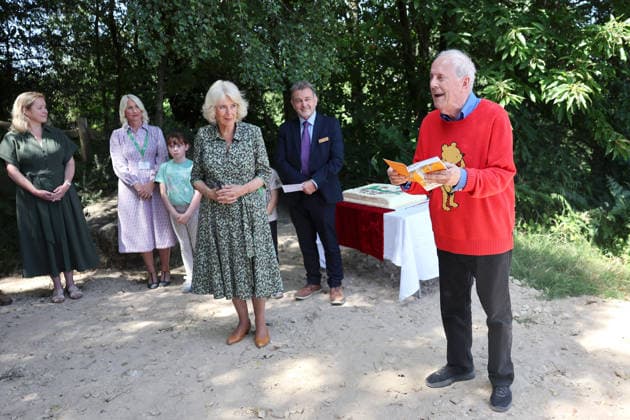 Queen Camilla Commemorates 100 Years Of Winnie The Pooh HARTFIELD, ENGLAND - JULY 07: Gyles Brandreth gives a reading alongside Queen Camilla during her visit to Ashdown Forest to commemorate 100 Years of Winnie-the-Pooh at Ashdown Forest on July 07, 2026 in Hartfield, England. Ashdown Forest was the inspiration for the Hundred Acre Wood in A.A. Milne s classic Winnie-the-Pooh children s books. The Queen visited the forest in her role as patron of the Royal Literary Fund., Credit:Chris Jackson PA ROTA - B68 Avalon United Kingdom, England, Hartfield, Ashdown Forest  Copyright: xChrisxJacksonx xPAxROTAx-xB68x xAvalonx 1115013562