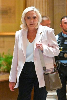 Marine Le Pen, president of the National Rally, leaves the Paris Court of Appeals, France, on July 7, 2026, following the verdict in the appeal trial of former and current RN members accused of embezzling European public funds in a case involving the creation of fictitious jobs at the European Parliament. The Court of Appeals sentenced Marine Le Pen, leader of the French far right, to one year of house arrest with an electronic ankle monitor in connection with this case, thereby jeopardizing her presidential candidacy next April. She was also barred from running for office for 15 months, a ban that was set to expire this year. Christian Liewig Bestimage President of the Rassemblement National parliamentary group Marine Le Pen leaves after  Copyright: xChristianxLiewigx xBestimagexChristianxLiewigx xBestimagex