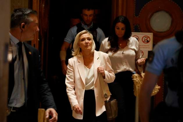MARINE LE PEN: PARIS COURT OF APPEALS DELIBERATES PHOTOPQR LE PARISIEN Olivier CORSAN Paris, July 7, 2026, France, July 7, 2026: Marine Le Pen at the Paris Court of Appeals for the deliberations in the case involving the so-called parliamentary assistants of the National Rally MARINE LE PEN DELIBERATIONS PARIS COURT OF APPEALS Paris, France, July 7, 2026 Marine Le Pen, president of the National Rally parliamentary group, leaves after the verdict in the appeal trial of former or current RN members charged with embezzlement of European public funds in a case involving alleged fake jobs at the European Parliament at the Paris Court of Appeal. On July 7, 2026, sentenced France’s far-right leader Marine Le Pen to one year of house arrest with a  Copyright: xPHOTOPQR LExPARISIEN MAXPPPxOlivierxCORSANx 20260707LPA8107 20260707LPA8107