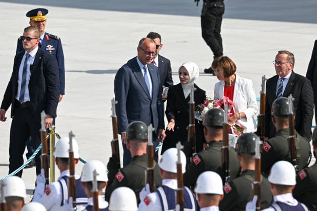 German Chancellor Friedrich Merz arrives Ankara for 36th NATO Summit ANKARA, TURKIYE - JULY 07: German Chancellor Friedrich Merz and his wife Charlotte Merz arrive at Ankara Airport ahead of the 36th NATO Summit in Ankara, Turkiye, on July 7, 2026. Turkish Minister of Family and Social Services Mahinur Ozdemir Goktas welcomes Chancellor Merz upon his arrival at the airport. Abdullah Guclu Anadolu Ankara Turkey. Editorial use only. Please get in touch for any other usage.  Copyright: x2026xAnadoluxAbdullahxGuclux