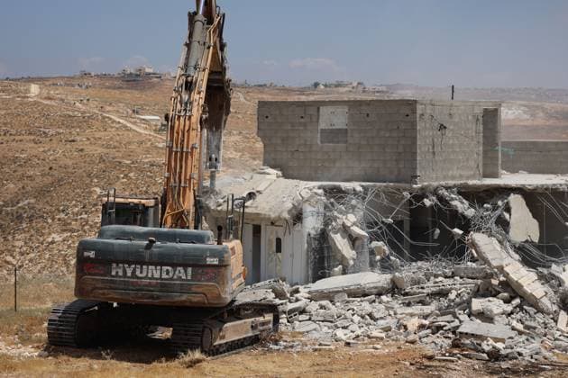 Israeli Forces Demolish Home in Masafer Yatta, Displacing Family of Eight Masafer Yatta, West Bank July 7, 2026: Israeli forces demolish the home of Palestinian detainee Mousa Al-Adra in the village of Al-Deirat in the Masafer Yatta area, south of Hebron, in the occupied West Bank, July 7, 2026. Israeli authorities said the structure lacked the required building permits. The demolition displaced a family of eight, including two parents and six children. Masafer Yatta Palestine, State of Copyright: x xMosabxshawerx xJNAxPressx