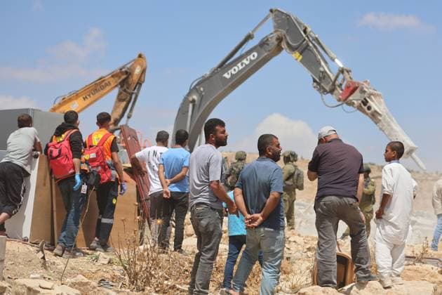 Israeli Forces Demolish Home in Masafer Yatta, Displacing Family of Eight Masafer Yatta, West Bank July 7, 2026: Israeli forces demolish the home of Palestinian detainee Mousa Al-Adra in the village of Al-Deirat in the Masafer Yatta area, south of Hebron, in the occupied West Bank, July 7, 2026. Israeli authorities said the structure lacked the required building permits. The demolition displaced a family of eight, including two parents and six children. Masafer Yatta Palestine, State of Copyright: x xMosabxshawerx xJNAxPressx
