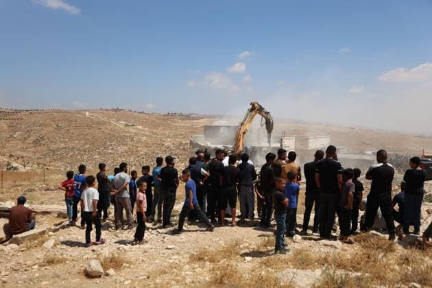 Israeli Forces Demolish Home in Masafer Yatta, Displacing Family of Eight Masafer Yatta, West Bank July 7, 2026: Israeli forces demolish the home of Palestinian detainee Mousa Al-Adra in the village of Al-Deirat in the Masafer Yatta area, south of Hebron, in the occupied West Bank, July 7, 2026. Israeli authorities said the structure lacked the required building permits. The demolition displaced a family of eight, including two parents and six children. Masafer Yatta Palestine, State of Copyright: x xMosabxshawerx xJNAxPressx