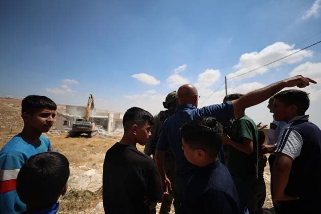 Israeli Forces Demolish Home in Masafer Yatta, Displacing Family of Eight Masafer Yatta, West Bank July 7, 2026: Israeli forces demolish the home of Palestinian detainee Mousa Al-Adra in the village of Al-Deirat in the Masafer Yatta area, south of Hebron, in the occupied West Bank, July 7, 2026. Israeli authorities said the structure lacked the required building permits. The demolition displaced a family of eight, including two parents and six children. Masafer Yatta Palestine, State of Copyright: x xMosabxshawerx xJNAxPressx