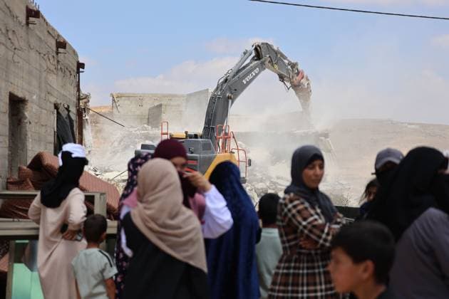 Israeli Forces Demolish Home in Masafer Yatta, Displacing Family of Eight Masafer Yatta, West Bank July 7, 2026: Israeli forces demolish the home of Palestinian detainee Mousa Al-Adra in the village of Al-Deirat in the Masafer Yatta area, south of Hebron, in the occupied West Bank, July 7, 2026. Israeli authorities said the structure lacked the required building permits. The demolition displaced a family of eight, including two parents and six children. Masafer Yatta Palestine, State of Copyright: x xMosabxshawerx xJNAxPressx