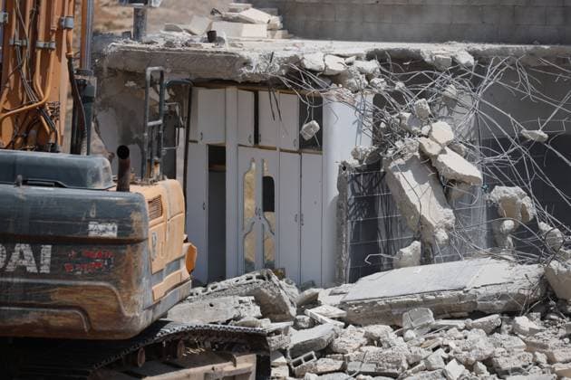 Israeli Forces Demolish Home in Masafer Yatta, Displacing Family of Eight Masafer Yatta, West Bank July 7, 2026: Israeli forces demolish the home of Palestinian detainee Mousa Al-Adra in the village of Al-Deirat in the Masafer Yatta area, south of Hebron, in the occupied West Bank, July 7, 2026. Israeli authorities said the structure lacked the required building permits. The demolition displaced a family of eight, including two parents and six children. Masafer Yatta Palestine, State of Copyright: x xMosabxshawerx xJNAxPressx