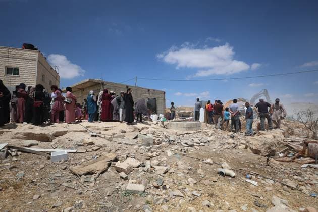 Israeli Forces Demolish Home in Masafer Yatta, Displacing Family of Eight Masafer Yatta, West Bank July 7, 2026: Israeli forces demolish the home of Palestinian detainee Mousa Al-Adra in the village of Al-Deirat in the Masafer Yatta area, south of Hebron, in the occupied West Bank, July 7, 2026. Israeli authorities said the structure lacked the required building permits. The demolition displaced a family of eight, including two parents and six children. Masafer Yatta Palestine, State of Copyright: x xMosabxshawerx xJNAxPressx
