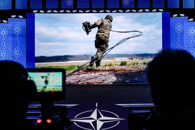 July 7, 2026, Ankara, Turkiye, Turkiye: A view from behind broadcast video cameras shows a dynamic military presentation of a soldier what appears to be him throwing cables projected on the main digital stage screen during the NATO Summit Defence Industry Forum (NSDIF) at the ATO Congresium. Ankara Turkiye  - ZUMAo116 20260707_znp_o116_031 Copyright: xBiancaxOterox