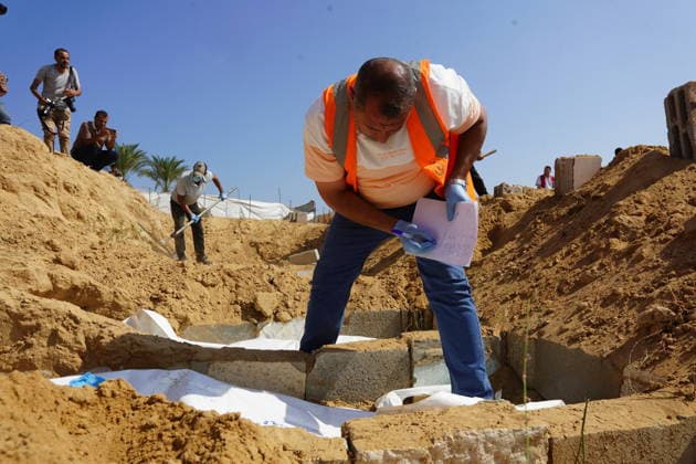 Red Cross teams examined the mass grave in the Deir al-Balah DEIR AL-BALAH, GAZA, PALESTINE - JULY 7: Officials of the International Committee of the Red Cross (ICRC) continue their work at a mass grave to collect samples from bodies for DNA testing during an investigation for unidentified victims of Israeli attacks in Deir al-Balah, Gaza, Palestine on July 07, 2026. Anas Zeyad Fteha Anadolu Deir al-Balah Gaza. Editorial use only. Please get in touch for any other usage.  Copyright: x2026xAnadoluxAnasxZeyadxFtehax