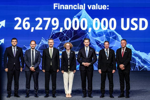 July 7, 2026, Ankara, Turkiye, Turkiye: ASELSAN CEO, AHMET AKYOL(L), President of the Turkish Secretariat of Defence Industries HALUK GORGUN (3rd L), and NATO Deputy Secretary General RADMILA SEKERINSKA (4th L) stand on stage with international defence officials and corporate executives before a digital screen displaying a total contract value of 26,279,000,000 USD during the Integrated Air and Missile Defence (IAMD) segment of the NATO Summit Defence Industry Forum at the ATO Congresium. The monumental multi-billion-dollar framework coordinates advanced multi-layered interception architecture and anti-air production lines across allied nations. Ankara Turkiye - ZUMAo116 20260707_znp_o116_032 Copyright: xBiancaxOterox