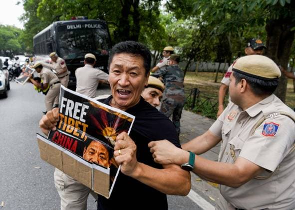 TYC Protests Near the Chinese Embassy in New Delhi New Delhi, Jul 07 (ANI): Police personnel detain a Tibetan Youth Congress (TYC) supporter as the party stages a protest over their various demands near the Chinese Embassy, in New Delhi on Tuesday. NEW DELHI Delhi India Copyright: xANIx ANI_20260707079