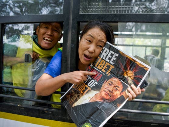 TYC Protests Near the Chinese Embassy in New Delhi New Delhi, Jul 07 (ANI): Police personnel detain a Tibetan Youth Congress (TYC) supporter as the party stages a protest over their various demands near the Chinese Embassy, in New Delhi on Tuesday. New Delhi Delhi India Copyright: xANIx ANI_20260707206