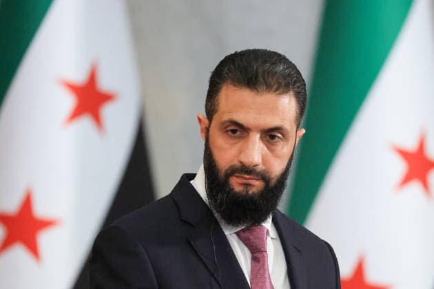 President Macron and President al-Sharaa Joint Press Conference - Damascus Syrian President Ahmed al-Sharaa looks on during a joint press conference with France s President in Damascus on July 7, 2026. French President Emmanuel Macron arrived in Damascus on July 6, 2026 for the first visit by a Western European head of state since Syria s new authorities took power in 2024, an AFP journalist said. Macron, who will depart on July 7, 2026, will advocate for a free, pluralist Syria that respects each of its components and plays a role in moderating Middle East tensions, the French presidency told journalists ahead of his arrival. Photo by Ludovic Marin Pool ABACAPRESS.COM Damascus Syria  Copyright: xMarinxLudovic Pool ABACAx
