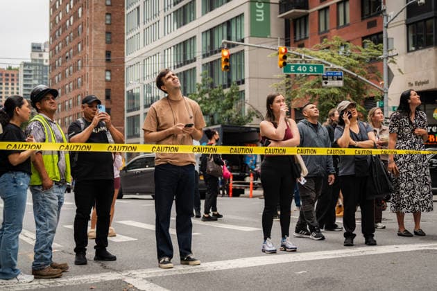 July 7, 2026, New York City, New York, United States: Bystanders on site New York City United States - ZUMAs378 20260707_zip_s378_016 Copyright: xIoannxMariaxStacewiczx