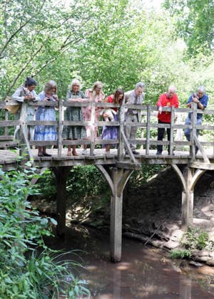 Queen Camilla visits Ashdown Forest Queen Camilla visits Ashdown Forest to commemorate 100 Years of Winnie-the-Pooh, in Ashdown Forest, Hartfield, East Sussex, UK, on the 7th July 2026. Picture by Chris Jackson WPA-Pool Hartfield Ashdown Forest East Sussex United Kingdom  WHA-0830