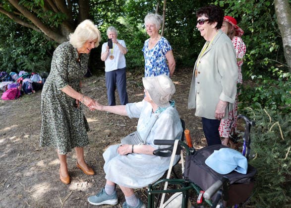 Queen Camilla visits Ashdown Forest Queen Camilla visits Ashdown Forest to commemorate 100 Years of Winnie-the-Pooh, in Ashdown Forest, Hartfield, East Sussex, UK, on the 7th July 2026. Picture by Chris Jackson WPA-Pool Hartfield Ashdown Forest East Sussex United Kingdom  WHA-0830
