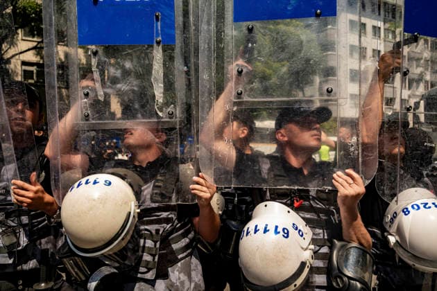 Anti NATO Demonstration Ankara Turkey July 7 Police officers stand in formation holding up their riot shields during an anti-NATO protest in Ankara, Turkey, on July 7, 2026. Ankara is hosting the NATO Summit on July 7-8, bringing together heads of state and government from numerous member countries. As security measures were intensified across the capital, police dispersed the demonstration, detained numerous protesters, and restricted access for journalists. Ankara Ankara Turkey Copyright: xMuratxKocabasx