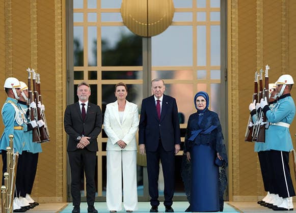 Turkey s President Tayyip Erdogan (CR) and his wife Emine Erdogan (R) welcoming Denmark s Prime Minister Mette Frederiksen (CL) during a reception hosted for heads of stade and government attending the 36th NATO Heads of State and Government Summit at the Presidential Complex in Ankara. on Tuesday, July 7, 2026.  TUR2026070740 TurkishxPresidencyxOffice
