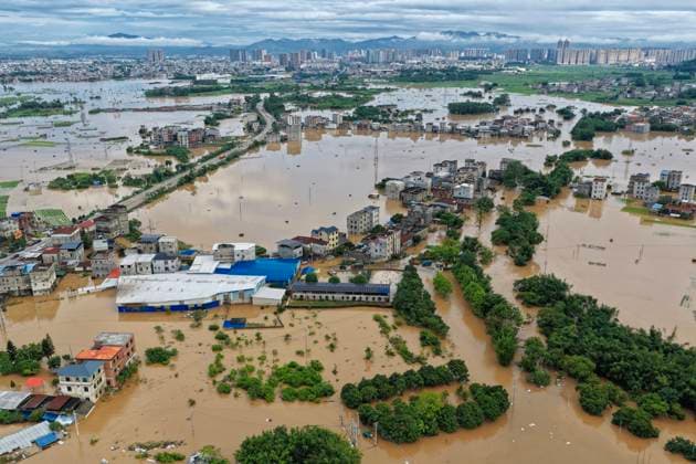 NANNING, CHINA - JULY 07: Houses and trees are submerged in flood waters after typhoon Maysak caused the Liulan Reservoir dam to breach on July 7, 2026 in Hengzhou, Nanning, Guangxi Zhuang Autonomous Region of China. Recent extreme rainstorms triggered by Typhoon Maysak, the 10th typhoon of the year, have caused severe flooding in parts of south China s Guangxi Zhuang Autonomous Region.  Copyright: xVCGx 111652913850