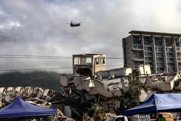 Aftermath of the Earthquake in Caraballeda, La Guaira, Venezuela CARABALLEDA, LA GUAIRA, VENEZUELA JULY 7, 2026: Rescue and forensic teams continue recovery operations in the aftermath of the devastating earthquakes that struck Venezuela s Caribbean coast, retrieving victims from the rubble of collapsed buildings in Caraballeda, La Guaira state. Authorities say the earthquakes have killed at least 3,685 people, injured more than 16,700, left thousands missing, and displaced nearly 18,000 residents, as search and recovery efforts continue in some of the hardest-hit areas. EDITOR S NOTE: Images show covered bodies during recovery operations. CARABALLEDA Venezuela (Bolivarian Republic of) Copyright: x xLauraxdexChiclanax xJNAxPressx