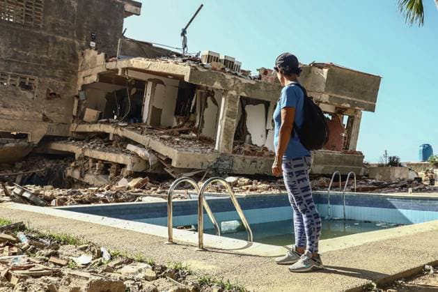 Aftermath of the Earthquake in Caraballeda, La Guaira, Venezuela CARABALLEDA, VENEZUELA JULY 7, 2026: Aura Milena Rodriguez stands among the ruins of her destroyed home in Caraballeda, La Guaira, as she searches for any trace of her son, JosÃ Miguel Gonzalez Rodriguez, 25, a Spanish citizen who has been missing since the powerful earthquakes struck Venezuela on June 24. Accompanied by rescue teams, Rodriguez returned to the collapsed building where her son was last seen, clinging to hope as search and recovery operations continue. Spanish authorities have confirmed the deaths of 35 Spanish citizens, while 140 others remain missing, including JosÃ Miguel. The earthquakes have killed at least 3,685 people, displaced nearly 18,000 re Copyright: x xLauraxdexChiclanax xJNAxPressx