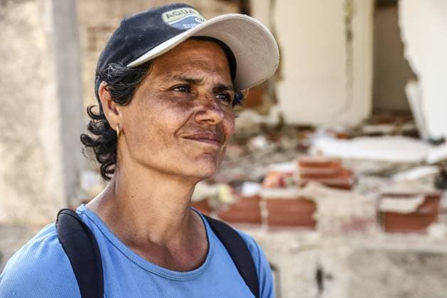 Aftermath of the Earthquake in Caraballeda, La Guaira, Venezuela CARABALLEDA, VENEZUELA JULY 7, 2026: Aura Milena Rodriguez stands among the ruins of her destroyed home in Caraballeda, La Guaira, as she searches for any trace of her son, JosÃ Miguel Gonzalez Rodriguez, 25, a Spanish citizen who has been missing since the powerful earthquakes struck Venezuela on June 24. Accompanied by rescue teams, Rodriguez returned to the collapsed building where her son was last seen, clinging to hope as search and recovery operations continue. Spanish authorities have confirmed the deaths of 35 Spanish citizens, while 140 others remain missing, including JosÃ Miguel. The earthquakes have killed at least 3,685 people, displaced nearly 18,000 re Copyright: x xLauraxdexChiclanax xJNAxPressx
