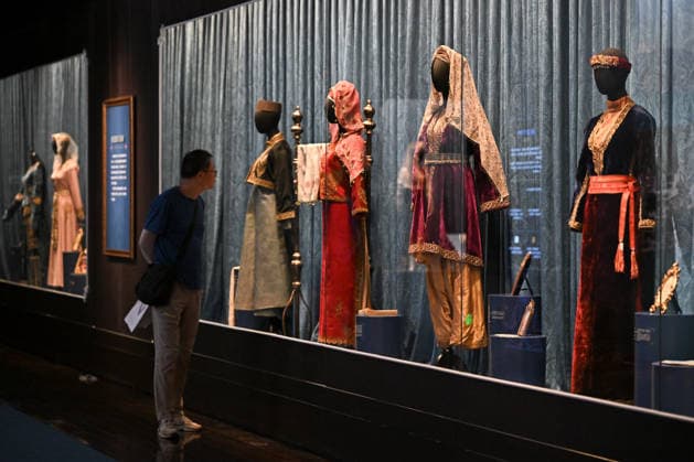 TAIYUAN, CHINA - JULY 08: Visitors view traditional Armenian costumes from the 19th century at an exhibition on July 8, 2026 in Taiyuan, Shanxi Province of China. The exhibition, titled Land of Noah, features 134 sets of artifacts from the History Museum of Yerevan, Armenia, marking the first large-scale display of these items in Shanxi.  Copyright: xChinaxNewsxServicex 111653054042