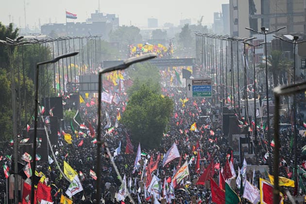 Thousands gather in Iraq for funeral procession of slain Iranian leader Khamenei NAJAF, IRAQ - JULY 8: A massive crowd of mourners carrying various flags and posters fills the streets during a farewell ceremony for slain Iranian supreme leader Ali Khamenei, in Najaf, Iraq, on July 8, 2026. Khamenei lost his life following joint US-Israeli attacks. Starting from the early hours of the morning, thousands of people flooded the squares and avenues to take part in the funeral procession and pay their final respects. Haidar Mohammed Ali Anadolu Najaf Iraq. Editorial use only. Please get in touch for any other usage.  Copyright: x2026xAnadoluxHaidarxMohammedxAlix