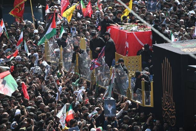 Thousands gather in Iraq for funeral procession of slain Iranian leader Khamenei NAJAF, IRAQ - JULY 8: A massive crowd of mourners carrying flags and posters fills the streets as the coffins of Iranian supreme leader Ali Khamenei and his family members are carried among the public inside a specially designed truck resembling the Imam Reza Shrine during a farewell ceremony in Najaf, Iraq, on July 8, 2026. Khamenei lost his life following joint US-Israeli attacks, drawing thousands to the squares and avenues since the early hours of the morning. Haidar Mohammed Ali Anadolu Najaf Iraq. Editorial use only. Please get in touch for any other usage.  Copyright: x2026xAnadoluxHaidarxMohammedxAlix