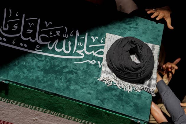 Farewell ceremony held for Iran s former leader Ali Khamenei in Najaf NAJAF, IRAQ - JULY 8: Large crowds carrying flags and posters attend the farewell ceremony held for former Iranian leader Ali Khamenei, who was killed in U.S.-Israeli attacks as in Najaf, Iran on July 8, 2026. The coffins of Khamenei and his family members are transported through the crowd in a specially designed truck after the Imam Reza Shrine before being brought to the Imam Ali Shrine. Karar Essa Anadolu Najaf Iraq. Editorial use only. Please get in touch for any other usage.  Copyright: x2026xAnadoluxKararxEssax