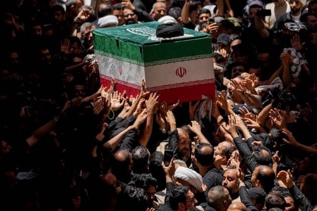 Farewell ceremony held for Iran s former leader Ali Khamenei in Najaf NAJAF, IRAQ - JULY 8: Large crowds carrying flags and posters attend the farewell ceremony held for former Iranian leader Ali Khamenei, who was killed in U.S.-Israeli attacks as in Najaf, Iran on July 8, 2026. The coffins of Khamenei and his family members are transported through the crowd in a specially designed truck after the Imam Reza Shrine before being brought to the Imam Ali Shrine. Karar Essa Anadolu Najaf Iraq. Editorial use only. Please get in touch for any other usage.  Copyright: x2026xAnadoluxKararxEssax