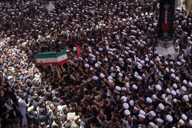 Farewell ceremony held for Iran s former leader Ali Khamenei in Najaf NAJAF, IRAQ - JULY 8: Large crowds carrying flags and posters attend the farewell ceremony held for former Iranian leader Ali Khamenei, who was killed in U.S.-Israeli attacks as in Najaf, Iran on July 8, 2026. The coffins of Khamenei and his family members are transported through the crowd in a specially designed truck after the Imam Reza Shrine before being brought to the Imam Ali Shrine. Karar Essa Anadolu Najaf Iraq. Editorial use only. Please get in touch for any other usage.  Copyright: x2026xAnadoluxKararxEssax