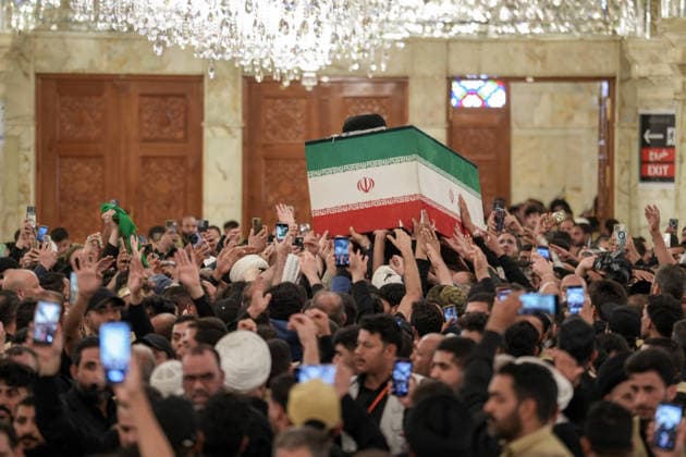 Farewell ceremony held for Iran s former leader Ali Khamenei in Najaf NAJAF, IRAQ - JULY 8: Large crowds carrying flags and posters attend the farewell ceremony held for former Iranian leader Ali Khamenei, who was killed in U.S.-Israeli attacks as in Najaf, Iran on July 8, 2026. The coffins of Khamenei and his family members are transported through the crowd in a specially designed truck after the Imam Reza Shrine before being brought to the Imam Ali Shrine. Karar Essa Anadolu Najaf Iraq. Editorial use only. Please get in touch for any other usage.  Copyright: x2026xAnadoluxKararxEssax