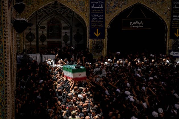 Farewell ceremony held for Iran s former leader Ali Khamenei in Najaf NAJAF, IRAQ - JULY 8: Large crowds carrying flags and posters attend the farewell ceremony held for former Iranian leader Ali Khamenei, who was killed in U.S.-Israeli attacks as in Najaf, Iran on July 8, 2026. The coffins of Khamenei and his family members are transported through the crowd in a specially designed truck after the Imam Reza Shrine before being brought to the Imam Ali Shrine. Karar Essa Anadolu Najaf Iraq. Editorial use only. Please get in touch for any other usage.  Copyright: x2026xAnadoluxKararxEssax