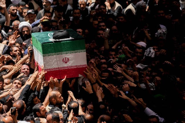 Farewell ceremony held for Iran s former leader Ali Khamenei in Najaf NAJAF, IRAQ - JULY 8: Large crowds carrying flags and posters attend the farewell ceremony held for former Iranian leader Ali Khamenei, who was killed in U.S.-Israeli attacks as in Najaf, Iran on July 8, 2026. The coffins of Khamenei and his family members are transported through the crowd in a specially designed truck after the Imam Reza Shrine before being brought to the Imam Ali Shrine. Karar Essa Anadolu Najaf Iraq. Editorial use only. Please get in touch for any other usage.  Copyright: x2026xAnadoluxKararxEssax
