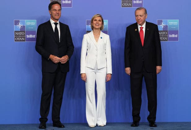 NATO Leaders Summit - Ankara NATO Secretary General Mark Rutte (L) and Turkey s President Recep Tayyip Erdogan greet Iceland s Prime Minister Kristrun Frostadottir as she arrives for a NATO Summit at Bestepe Presidential Compound in Ankara, Turkey, July 8, 2026. The summit comes at a fraught time for the 77-year-old transatlantic alliance, with the US President demanding members make good on a pledge to ramp up defence spending as Washington takes a step back from Europe. Photo by Ludovic Marin Pool ABACAPRESS.COM Ankara Turkey  Copyright: xMarinxLudovic Pool ABACAx