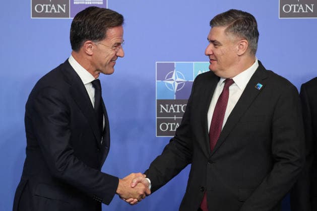 NATO Leaders Summit - Ankara NATO Secretary General Mark Rutte (L) greets Croatia s President Zoran Milanovic as he arrives for a NATO Summit at Bestepe Presidential Compound in Ankara, Turkey, July 8, 2026. The summit comes at a fraught time for the 77-year-old transatlantic alliance, with the US President demanding members make good on a pledge to ramp up defence spending as Washington takes a step back from Europe. Photo by Ludovic Marin Pool ABACAPRESS.COM Ankara Turkey  Copyright: xMarinxLudovic Pool ABACAx