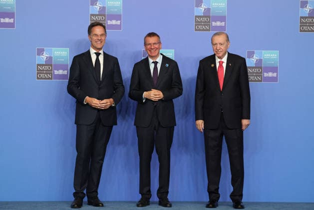NATO Leaders Summit - Ankara NATO Secretary General Mark Rutte (L) and Turkey s President Recep Tayyip Erdogan (R) greet Latvia s President Edgars Rinkevics as he arrives for a NATO Summit at Bestepe Presidential Compound in Ankara, Turkey, July 8, 2026. The summit comes at a fraught time for the 77-year-old transatlantic alliance, with the US President demanding members make good on a pledge to ramp up defence spending as Washington takes a step back from Europe. Photo by Ludovic Marin Pool ABACAPRESS.COM Ankara Turkey  Copyright: xMarinxLudovic Pool ABACAx