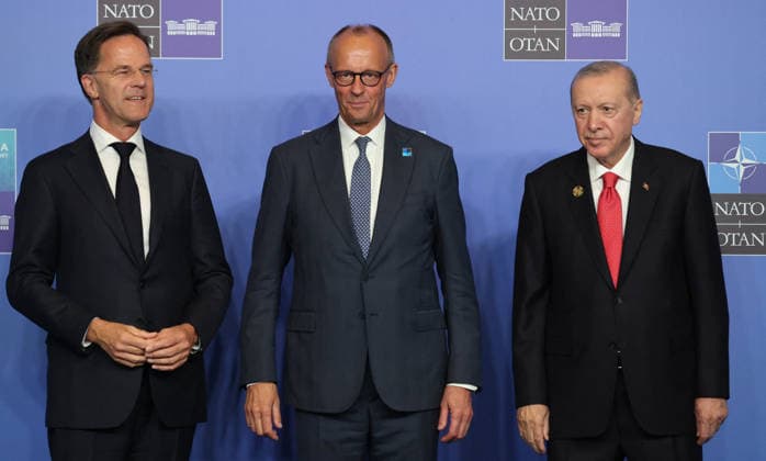NATO Leaders Summit - Ankara NATO Secretary General Mark Rutte (L) and Turkey s President Recep Tayyip Erdogan (R) greet Germanyís Chancellor Friedrich Merz as he arrives for a NATO Summit at Bestepe Presidential Compound in Ankara, Turkey, July 8, 2026. The summit comes at a fraught time for the 77-year-old transatlantic alliance, with the US President demanding members make good on a pledge to ramp up defence spending as Washington takes a step back from Europe. Photo by Ludovic Marin Pool ABACAPRESS.COM Ankara Turkey  Copyright: xMarinxLudovic Pool ABACAx