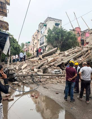 Under-Construction Building Collapses in New Delhi s Rohini Sector 16 New Delhi, Jul 08 (ANI): Piles of rubble present after an under-construction building collapsed at Rohini s Sector 16, in New Delhi on Wednesday. Firefighting and rescue operations underway. NEW DELHI Delhi India Copyright: xANIx ANI_20260708362
