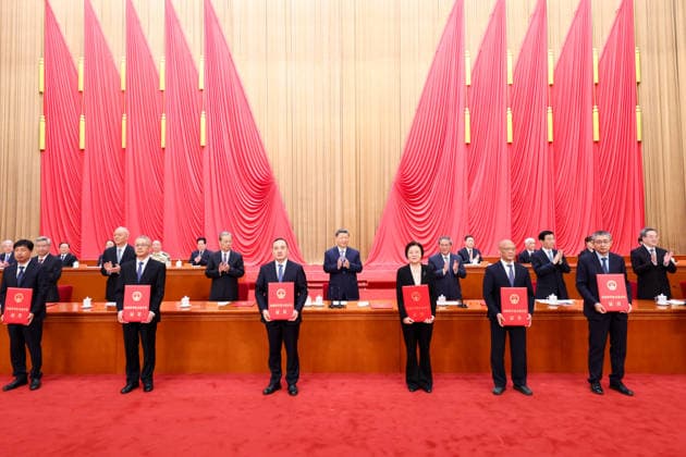 (260708) -- BEIJING, July 8, 2026 -- Xi Jinping and other leaders of the Communist Party of China and the state, together with the two winners of the national top sci-tech award, present certificates to representatives of recipients of the State Natural Science Award, the State Technological Invention Award, the State Scientific and Technological Progress Award and the China International Science and Technology Cooperation Award at the Great Hall of the People in Beijing, capital of China, July 8, 2026. A meeting bringing together the national science and technology award conference, the general assemblies of the members of the Chinese Academy of Sciences (CAS) and the Chinese Academy of Engineering (CAE), and the 11th national congress of 