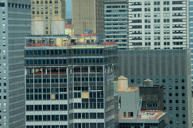 July 8, 2026, New York, New York, USA: View of the top floors of the commercial building in Midtown Manhattan of New York, NY on July 8, 2026 which was under construction to be converted as residential where on July 7 reported that a steel beam on the 21st floor was compromised, and the Fire Department said that two support columns inside the building were buckling and several upper floors were sagging. The building remains at risk of collapse and engineers are working to secure it. New York USA - ZUMAr339 20260708_znp_r339_014 Copyright: xLevxRadinx