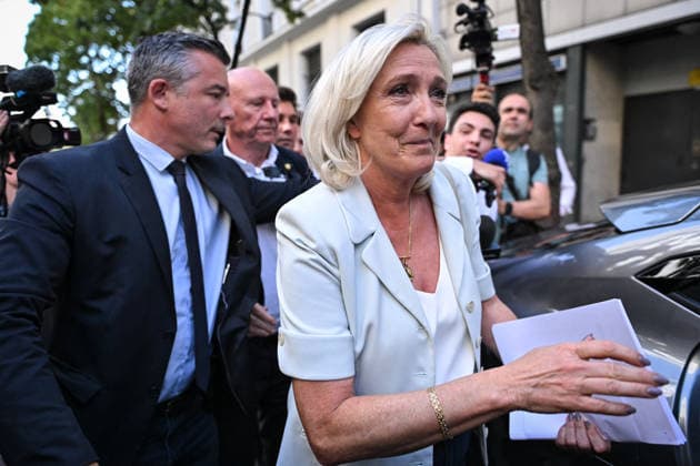 Far Right Rassemblement National Party Meeting in Paris French far-right leader Marine Le Pen leaves after a national council for French far right Rassemblement National Party at its headquarters in on July 8, 2026. Photo by Firas Abdullah ABACAPRESS.COM Paris Ile-de-France France  Copyright: xAbdullahxFiras ABACAx