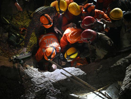 Rescue and relief operations underway after a building collapsed at the Rohini Sector 16 area New Delhi, Jul 08 (ANI): NDRF personnel rescue a survivor trapped under the debris after a building collapsed at the Rohini Sector 16 area, in New Delhi on Wednesday. New Delhi Delhi India Copyright: xANIx ANI_20260708554