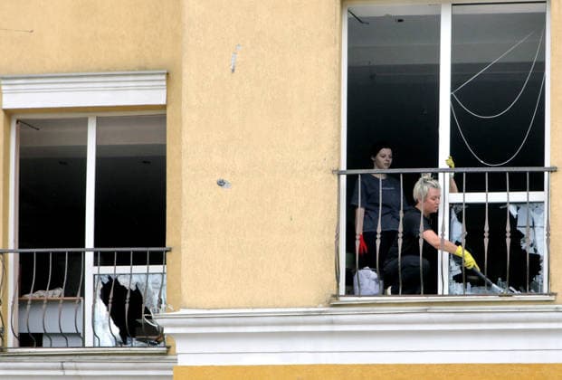 RECORD DATE NOT STATED Aftermath Of Russian Attack In Vyshneve - Ukraine Girls clear shattered glass from a windowsill in a house damaged by the overnight Russian attack of July 6, Vyshneve, Kyiv region, Ukraine, on July 7, 2026. Russian forces launched a massive attack on Kyiv and the surrounding region using various types of missiles and attack drones. According to the State Emergency Service of Ukraine, seven people were killed in Vyshneve. Residential development on five streets was completely destroyed, while warehouses and businesses sustained damage. More than 600 local residents were evacuated because of the risk posed by unexploded ordnance Photo by Volodymyr Tarasov Ukrinform ABACAPRESS.COM Kyiv region Ukraine  Copyright: xTarasovxVolodymyr Ukrinform ABACAx