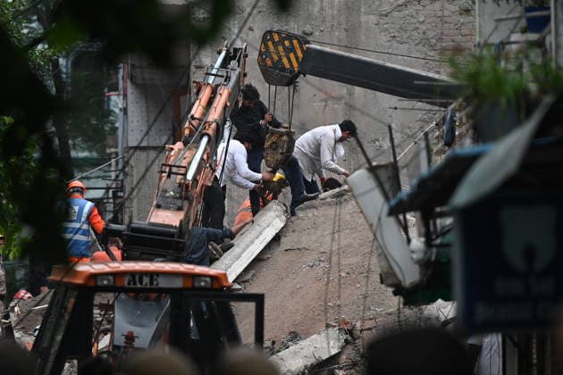 NEW DELHI, INDIA - JULY 8: A four-storey building collapsed in north west Delhi s Rohini Sector 16 on Wednesday evening amid rainfall, triggering a major rescue operation as several people are feared trapped beneath the debris on July 8, 2026 in New Delhi, India. (Photo by Ishant Chauhan Hindustan Times) Man Killed As Under-Construction Building Collapses In Delhi s Rohini Sector 16