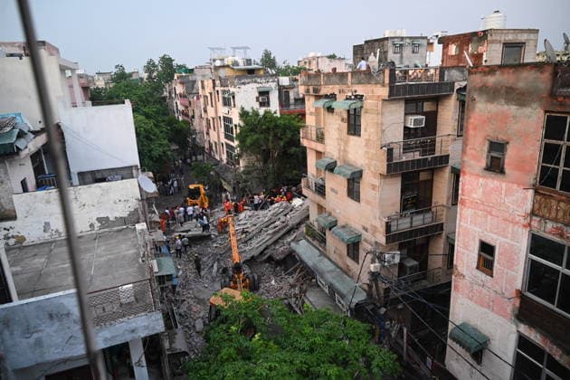 NEW DELHI, INDIA - JULY 8: A four-storey building collapsed in north west Delhi s Rohini Sector 16 on Wednesday evening amid rainfall, triggering a major rescue operation as several people are feared trapped beneath the debris on July 8, 2026 in New Delhi, India. (Photo by Ishant Chauhan Hindustan Times) Man Killed As Under-Construction Building Collapses In Delhi s Rohini Sector 16