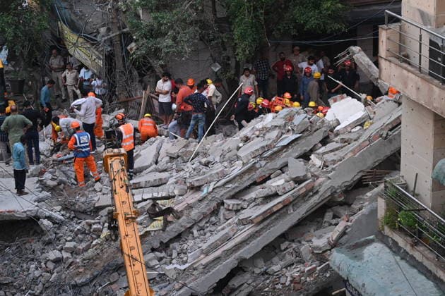 NEW DELHI, INDIA - JULY 8: NDRF personnel rescue a survivor trapped under the debris after a building collapsed in G Block, Sector 16, Rohini on July 8, 2026 in New Delhi, India. Rescue operations were launched immediately, with multiple emergency agencies deployed to search for and evacuate those trapped beneath the rubble. (Photo by Ishant Chauhan Hindustan Times) Man Killed As Under-Construction Building Collapses In Delhi s Rohini Sector 16
